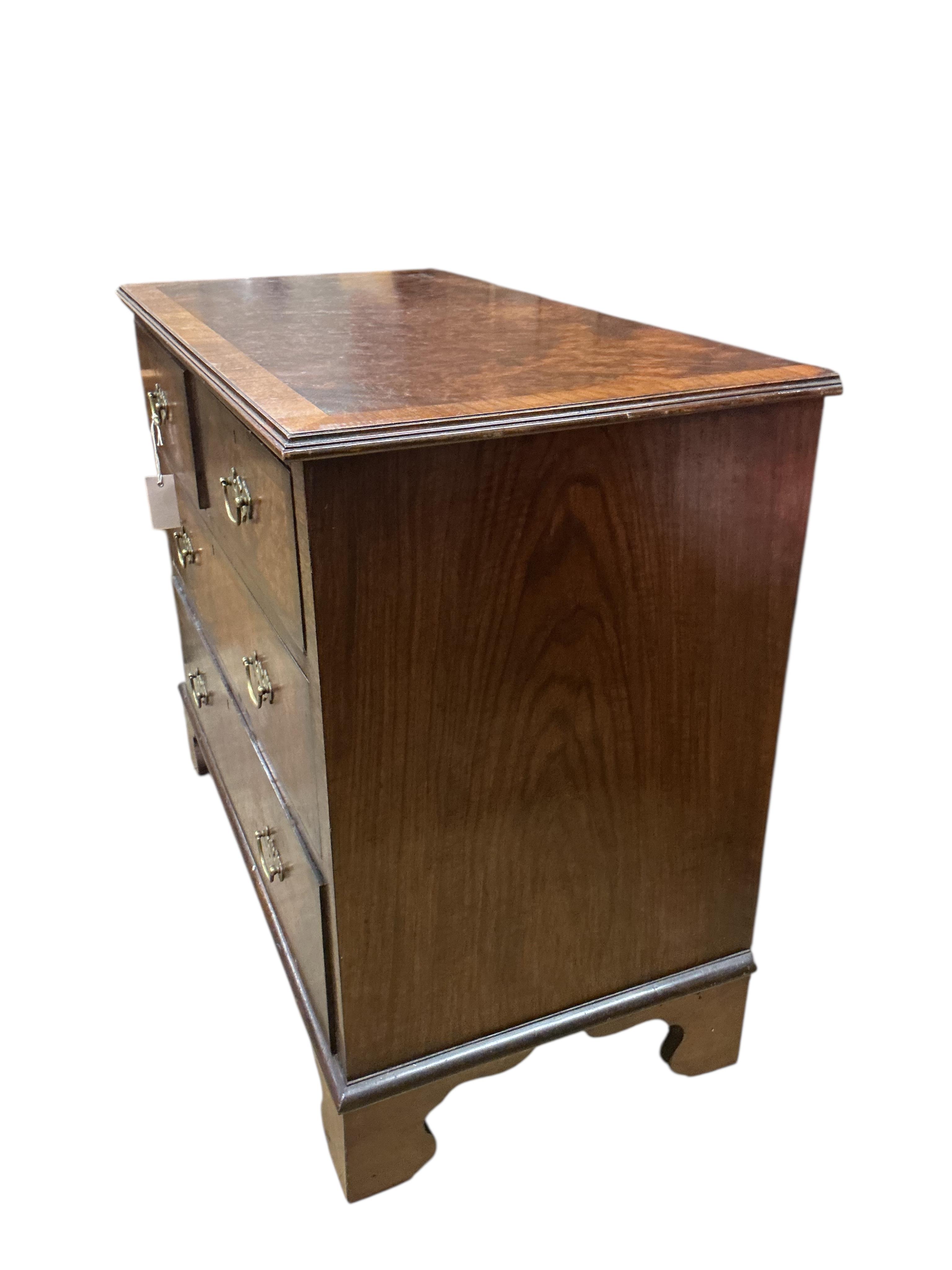 A small George III style banded walnut chest of drawers, width 90cm, depth 47cm, height 76cm
